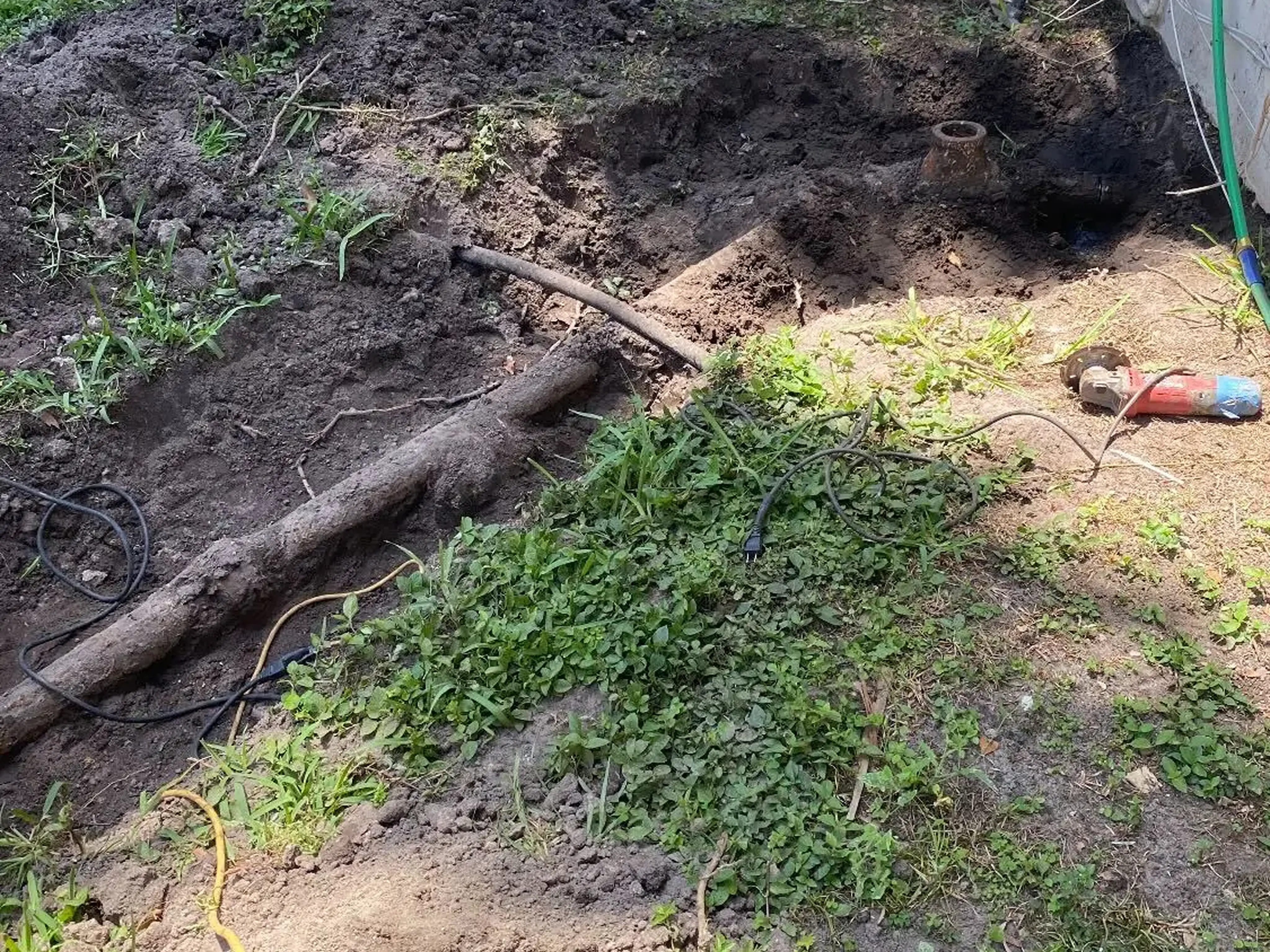 Technician marking inspection spot on floor